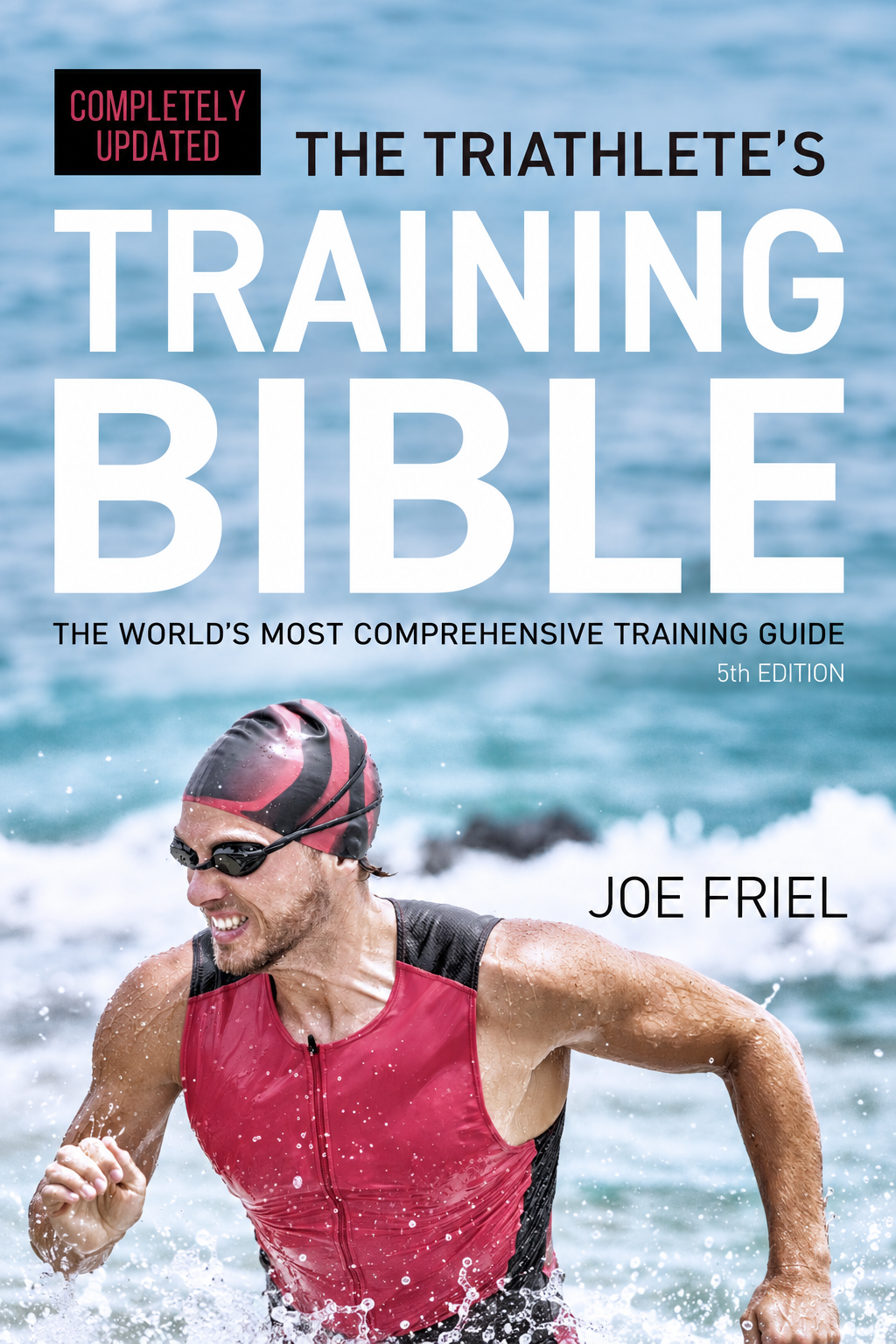 Portada del libro The Triathlete’s Training Bible, de Joe Friel, con un atleta saliendo del agua tras la natación